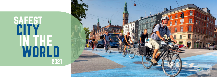 People riding a bike in Copenhagen